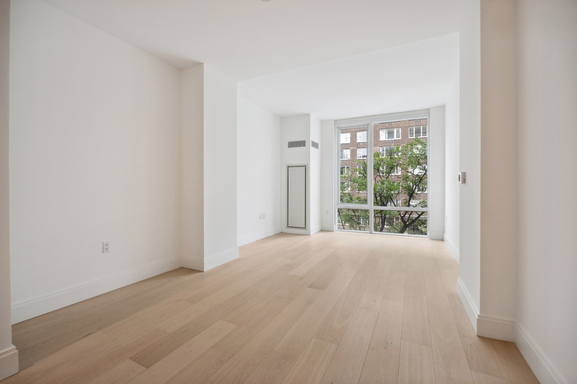 Light-filled interior with floor-to-ceiling window